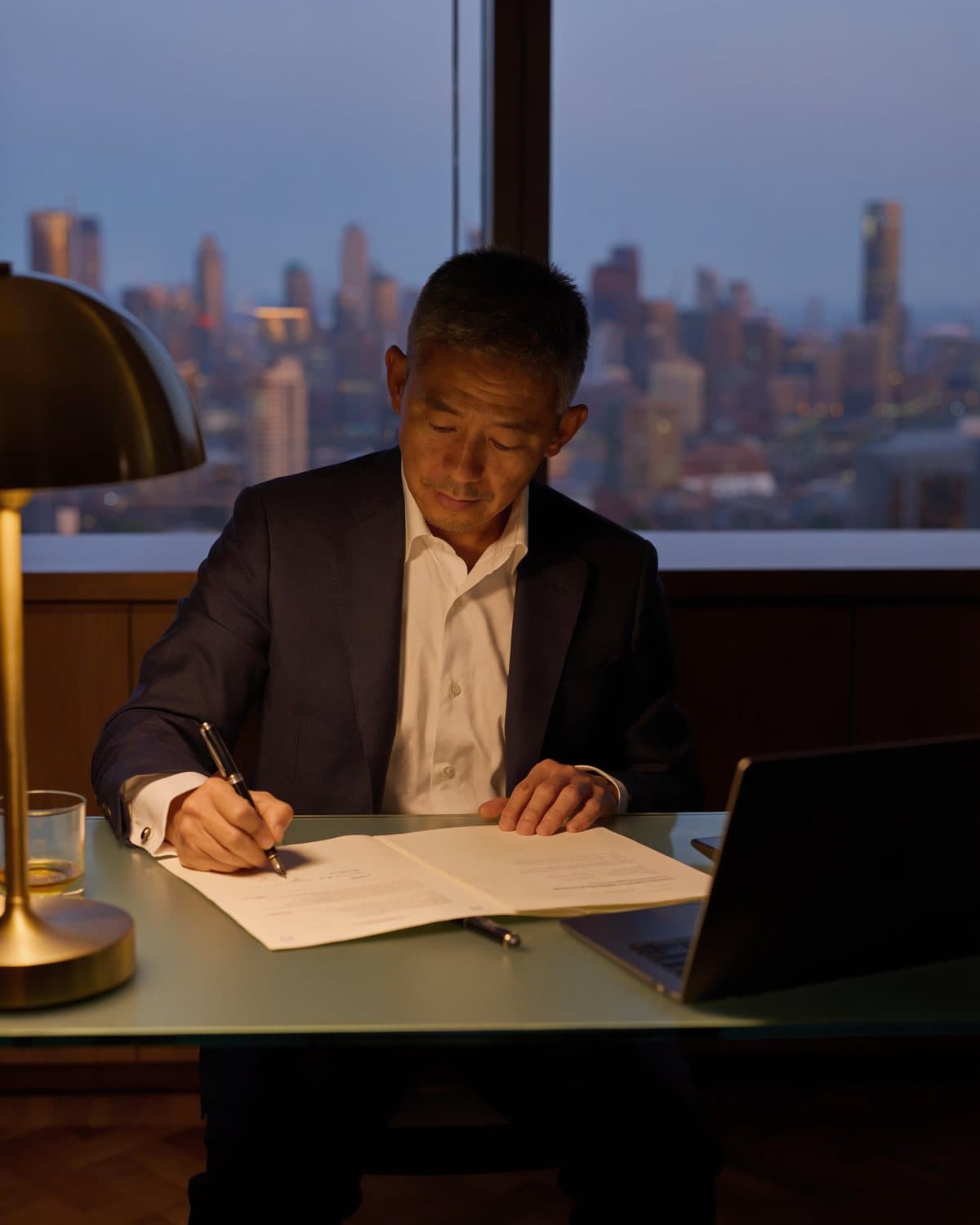 A compliance officer at work in an office in Asia.